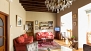 Seville Apartment - Living room with large windows facing the Cathedral.