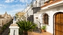 Sevilla Apartamento - Lower level terrace. Wrought iron circular stairs lead to the upper two terraces.