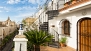 Séville Appartement - Lower level terrace. Wrought iron circular stairs lead to the upper two terraces.