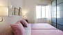 Sevilla Apartamento - Bedroom 2 also has twin beds and a wardrobe.