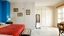 Seville Apartment - Master bedroom with double bed and built-in wardrobe (upper level).