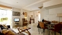 Seville Apartment - The apartment is decorated with original artwork from all over the world (lower level).