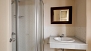 Seville Apartment - En-suite bathroom with shower (lower level).
