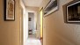 Seville Apartment - Corridor on the upper floor with doors to bathroom, bedroom and terrace.