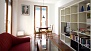 Seville Apartment - Sitting area with two french windows.