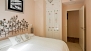 Seville Apartment - Bedroom 2 with double bed and fitted wardrobe.