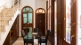 Seville Apartment - Dining area with table and chairs (ground floor).