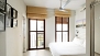 Sevilla Apartamento - View towards the bedroom, with double bed and en-suite bathroom.