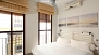 Sevilla Apartamento - Bedroom with 2 windows facing c/ Archeros - a quiet pedestrian street, without car traffic.