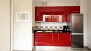 Sevilla Apartamento - Main appliances include: fridge-freezer, washing machine, microwave, stove.