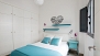Sevilla Apartamento - Bedroom with double bed and wardrobe.