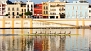 Sevilla Ferienwohnung - View of Betis street, with the apartment building in the center - the Red house.