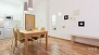 Seville Apartment - Beyond the dining area is the kitchen.