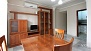 Seville Apartment - Dining area with chairs.