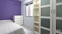 Sevilla Apartamento - Bedroom 2 with single bed and wardrobe.