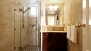 Sevilla Ferienwohnung - Bathroom 1 with a walk-in shower.