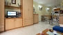 Sevilla Apartamento - Living area with the kitchen to the right.