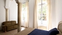 Seville Apartment - Two large windows face a quiet courtyard with plants (without access for guests).