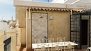 Sevilla Ferienwohnung - Terrace with a large canopy.