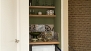 Seville Apartment - Cupboard kitchen next to the terrace.