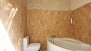 Sevilla Ferienwohnung - Bathroom 1 features a large corner bathtub.