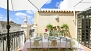 Sevilla Ferienwohnung - Terrace furnished with a large dining table and chairs - ideal to enjoy a meal outside.