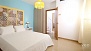 Sevilla Apartamento - Bedroom 1 has a double bed (1.50 x 2.00m) and a wardrobe.