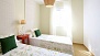 Séville Appartement - Bedroom 2 has twin beds (0.90 x 2.00 m).
