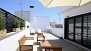 Seville Apartment - Terrace with outdoor seating and 2 deck chairs.