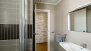 Seville Apartment - Bathroom with shower, washbasin and WC.