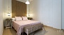 Séville Appartement - Bedroom 1 has a double bed and a wardrobe to store your belongings.