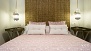 Séville Appartement - Bedroom 1 has a double bed (1.50 x 2.00m).