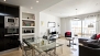 Seville Apartment - Living room with large window to calle Sierpes.