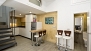 Séville Appartement - View towards the open-plan kitchen. On the right is the first bathroom.