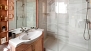 Seville Apartment - En-suite bathroom with a walk-in shower.