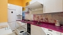 Seville Apartment - Kitchen. Main appliances include: fridge-freezer, dishwasher, washing-machine, vitroceramic stove, oven and microwave.