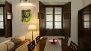 Seville Apartment - Dining area with a table and 4 chairs.