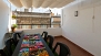 Séville Appartement - Terrace with table, chairs and canopy.