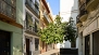 Séville Appartement - View of the facade - house on the left with the 4 balconies.