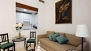 Seville Apartment - Living-dining space. The sofa can be used as a double bed for 2 additional guests.