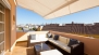 Seville Apartment - Terrace with sofas a canopy.