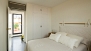 Sevilla Apartamento - Bedroom 1 with double bed and wardrobe.