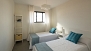 Sevilla Apartamento - Bedroom 2 with twin beds.