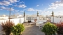 Séville Appartement - Terrace No.2 (shared). With deckchairs, parasol, plants and an outdoor shower.