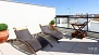 Seville Apartment - Terrace with 2 deck chairs.