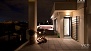 Séville Appartement - Ambient lighting of the terrace at night.