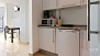 Seville Apartment - Small kitchenette well-equipped with utensils and appliances for self-catering.